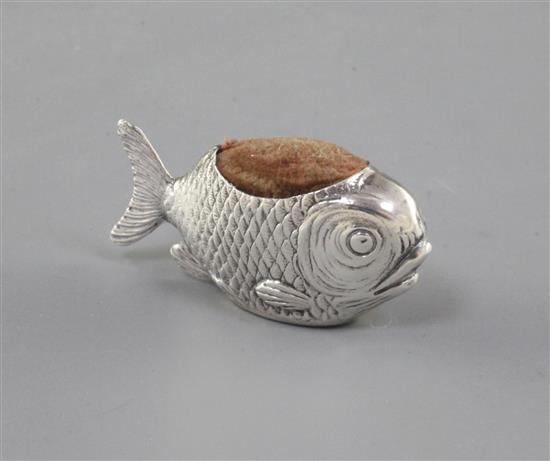 An Edwardian novelty silver pin cushion modelled as a fish by Sampson Mordan & Co, 1.5in.